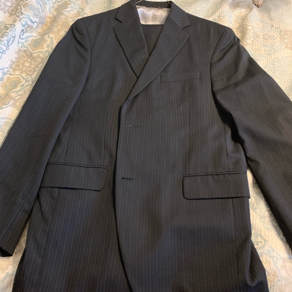 Men’s black pin striped suit